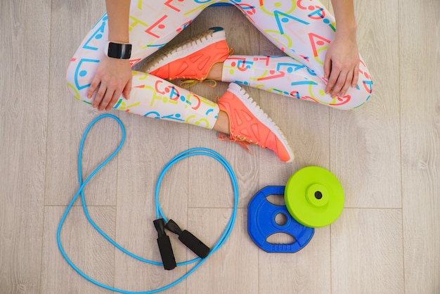 Girl with fitness accessories