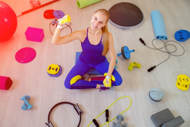 Girl with fitness accessories