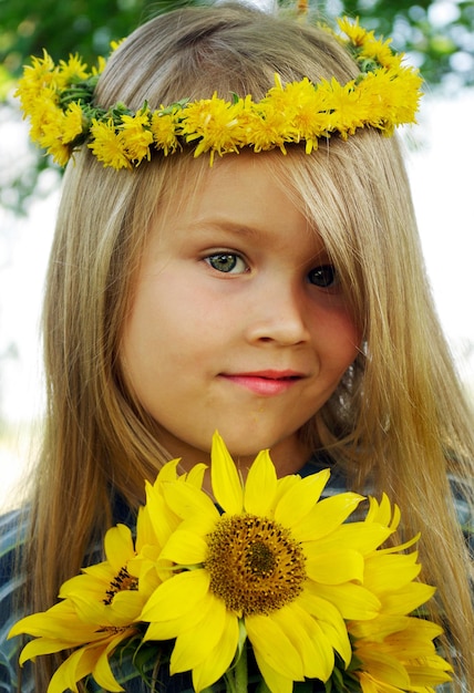 A girl with a flower crown on her head