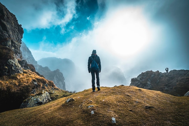 Girl with fog above the mount of Aiako Harria Guipuzcoa Basque Country