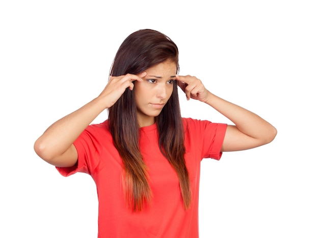 Girl with headache isolated on a white background