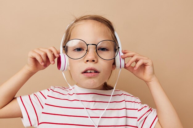 Girl with headphones and glasses music entertainment