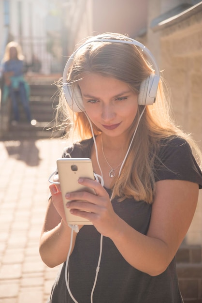 Girl with headphones listening to music