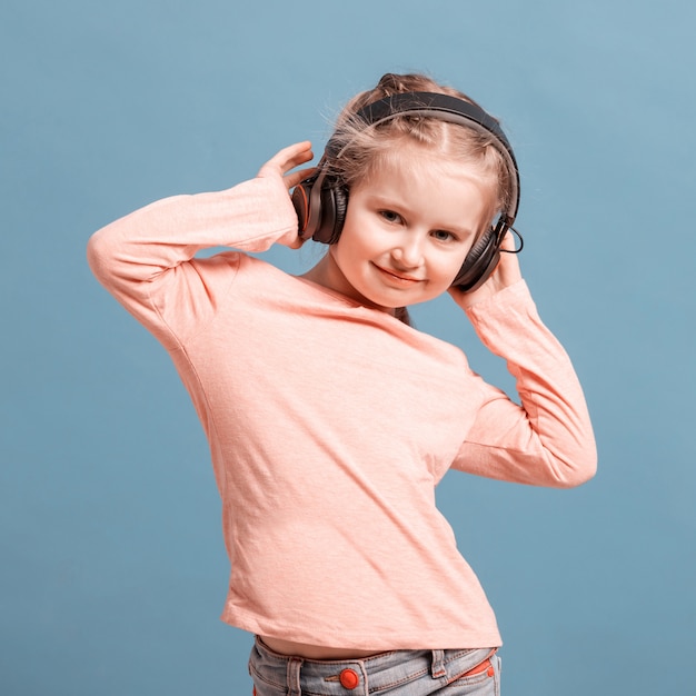 Girl with headphones listening to music