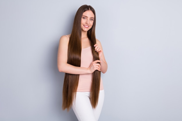 girl with healthy hair isolated on grey