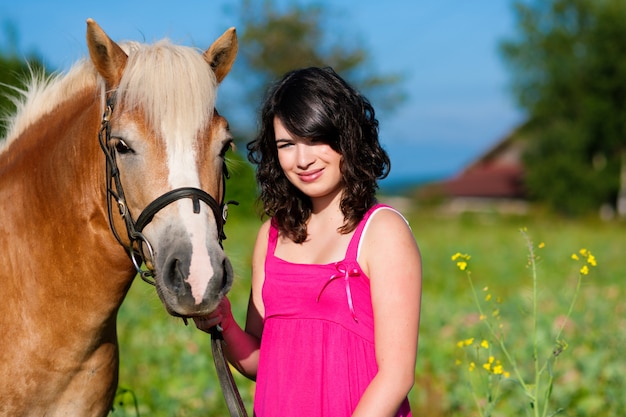 Girl with her horse