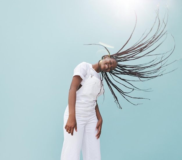 Girl with long braids enjoying a sunny day