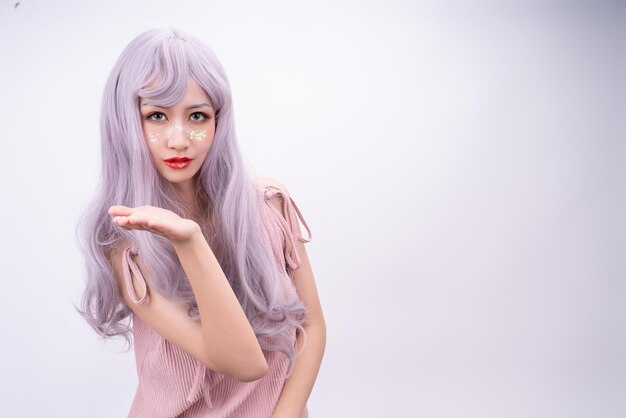 A girl with long hair in pink