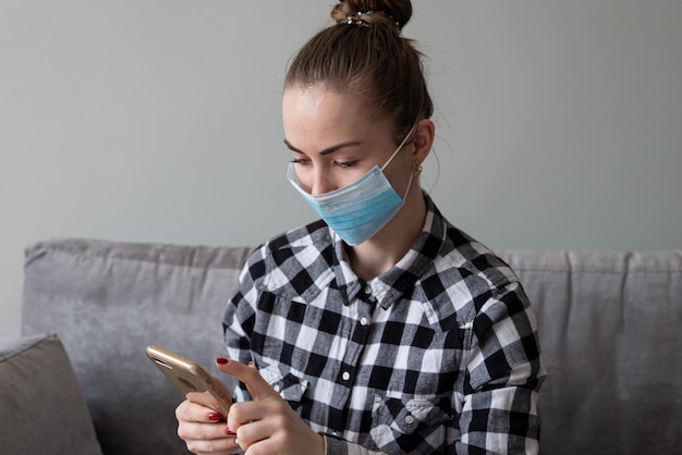 Girl with medical mask to protect her from virus