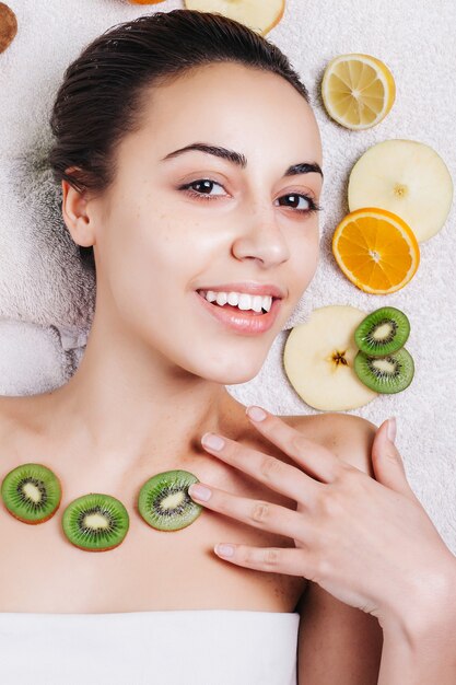 Girl with natural homemade fruit facial mask