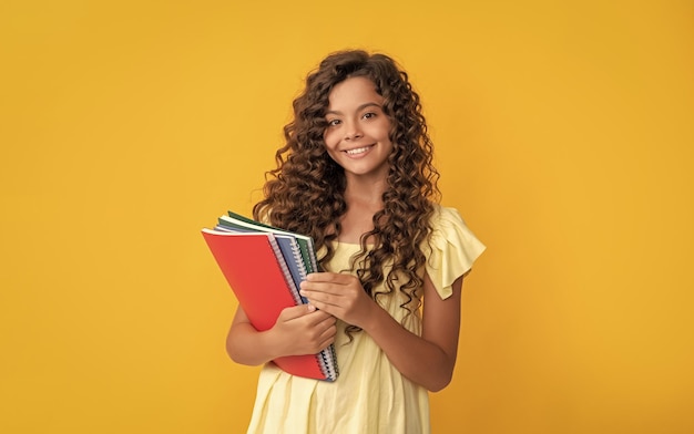 Photo girl with notebook back to school teen girl ready to study happy childhood