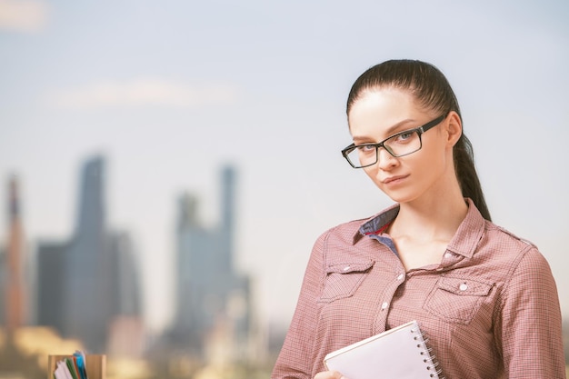 Girl with notepad