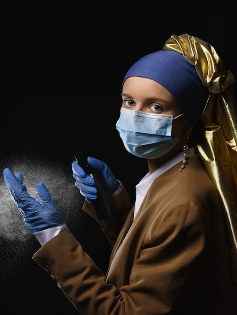 Girl with a pearl earring in a medical mask and glowes