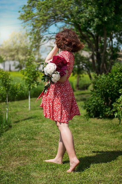 Girl with peonies