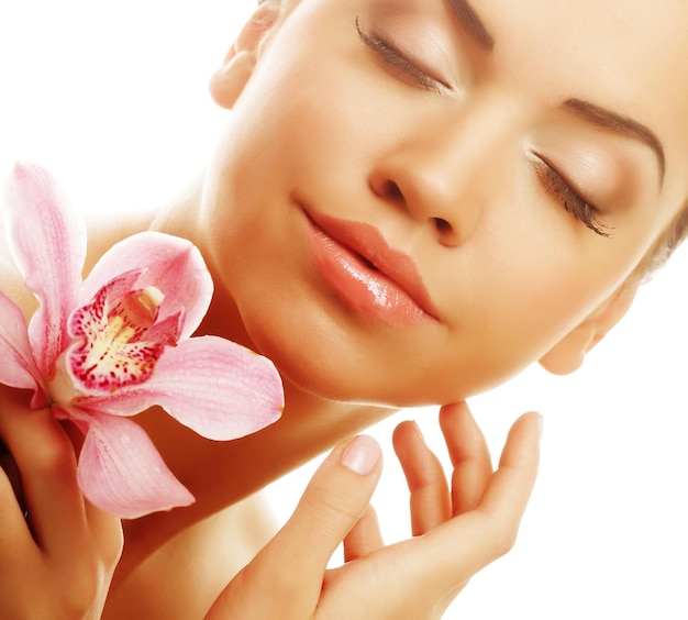 Girl with pink flower on white background