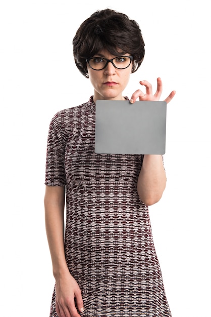 Girl with pop look holding an empty placard