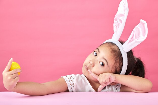 Girl with rabbit ears Easter day