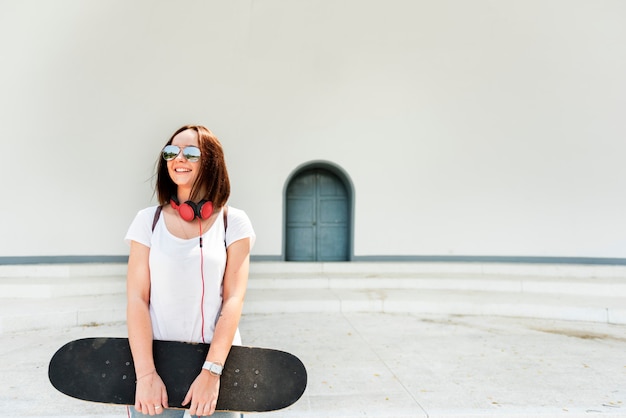 A girl with a skateboard