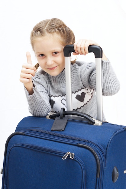 Photo girl with suitcase