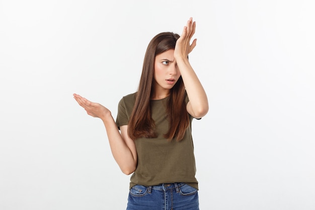 Girl with a suspicious look and hand on her side on 