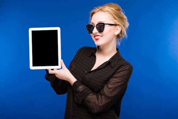 Girl with a tablet in hands