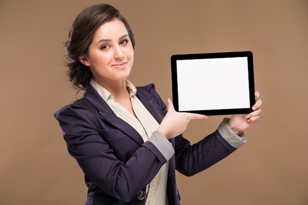 Girl with a tablet in hands