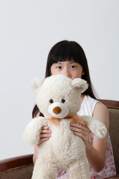 Girl with teddy bear