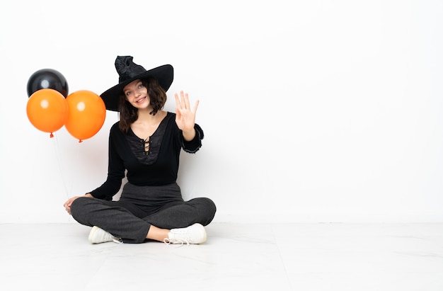 Girl with witch costume for halloween parties