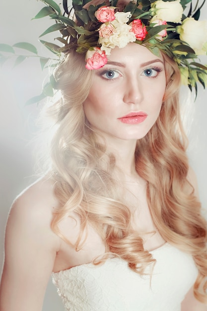 Girl with a wreath of flowers on her head