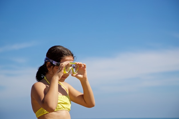 Girl with yellow diving mask