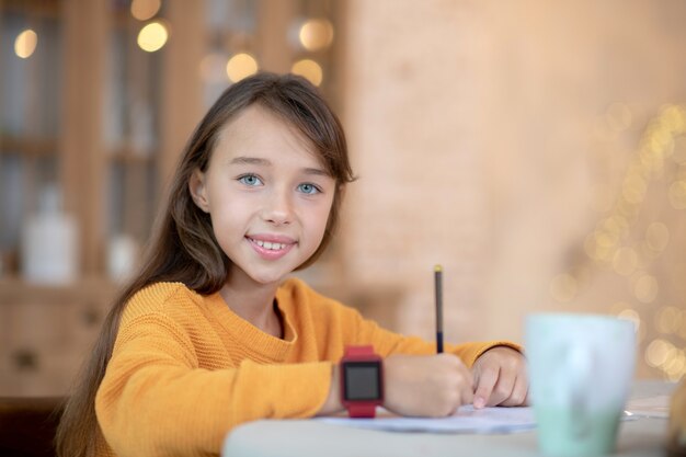 Girl working on her lessons