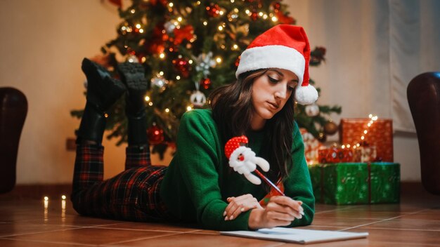 Photo girl writes letter to santa claus