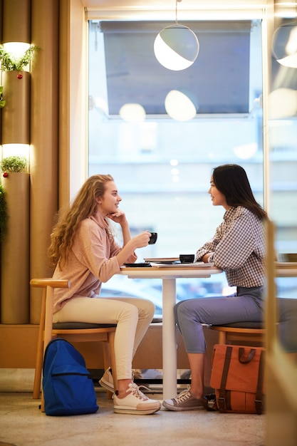 Girlfriends Enjoying Coffee