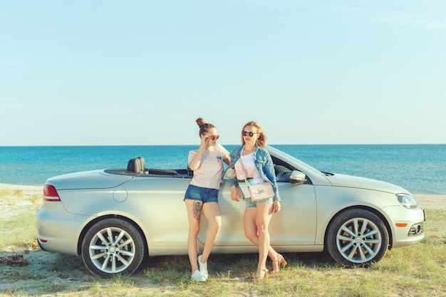 Girlfriends Having Fun in a Convertible