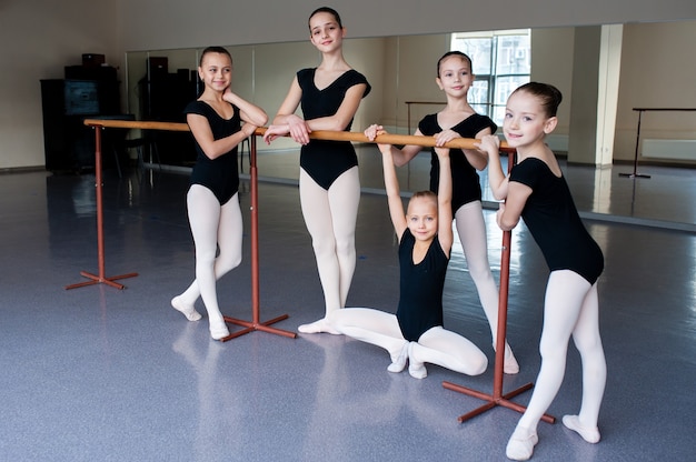 Girls communicate in class at the ballet school.