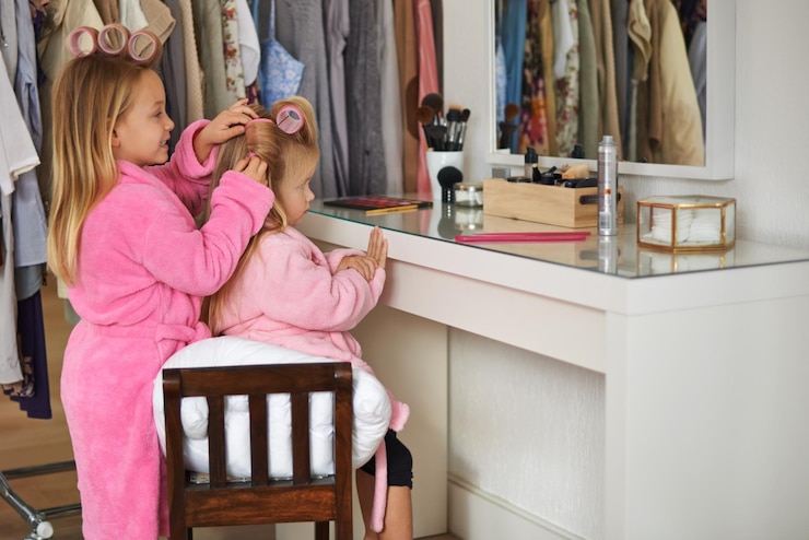 Photo girls hairstyle and kids with grooming fun or home with vacation or bonding together play bedroom or sisters with weekend break or holiday with siblings or childhood with happiness or apartment