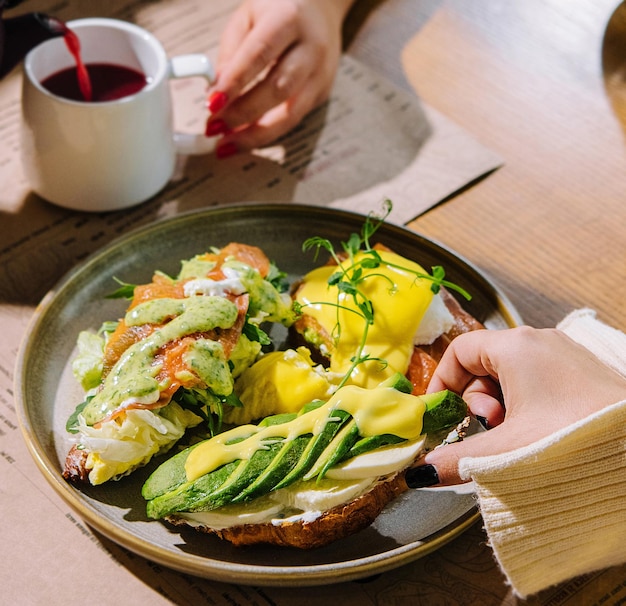 Girls have breakfast in a cafe