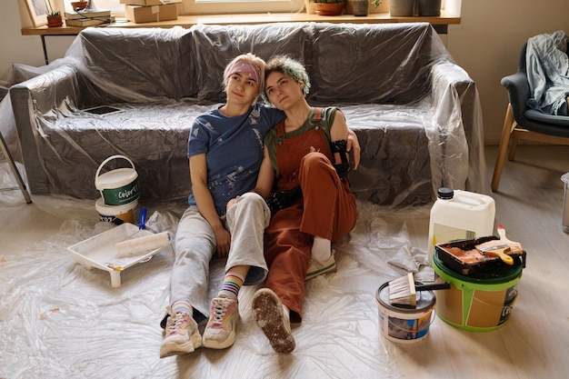 Girls having a break during repair