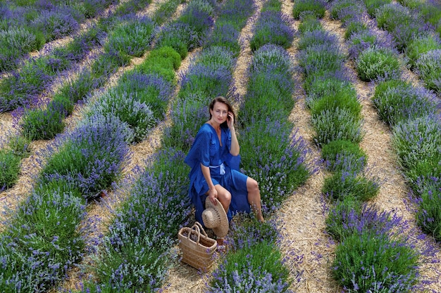 Girls in lavender flowers on the field