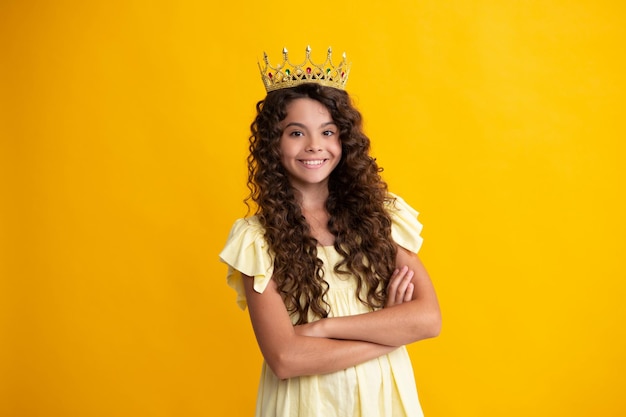 Girls party funny kid in crown Child queen wear diadem tiara Cute little princess portrait Happy teenager positive and smiling emotions of teen girl