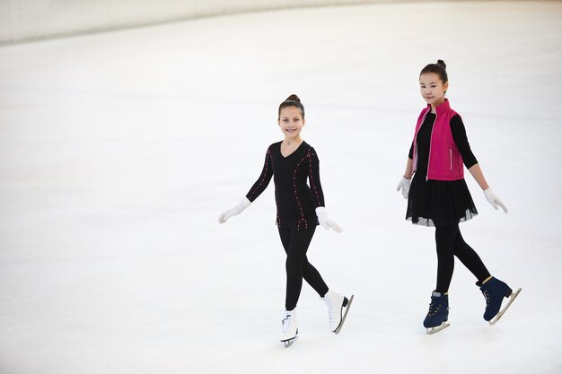 Girls Posing on Skating Rink