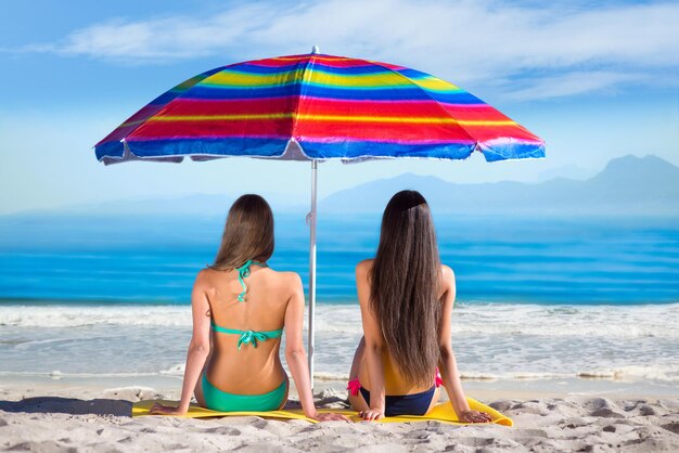 Girls resting on the sea