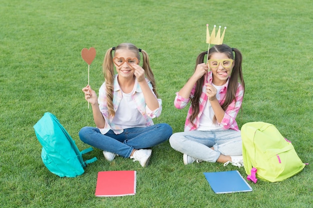 Girls school pupils having fun together fresh air entertainment concept