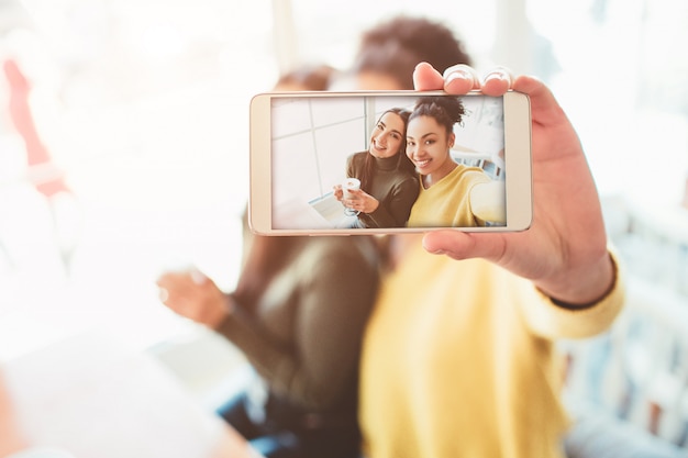 Girls taking a selfie together