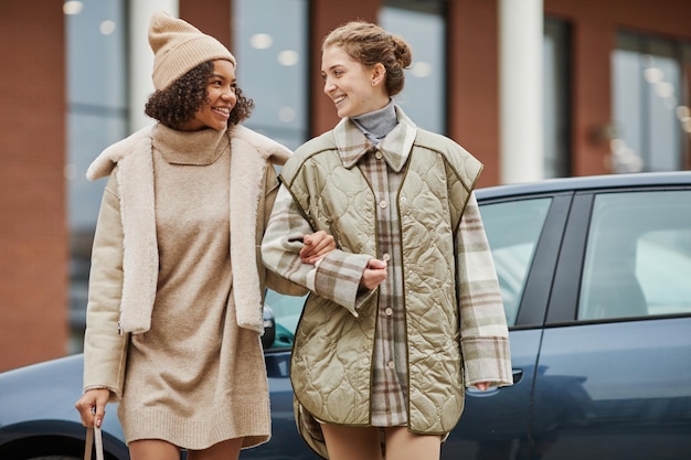 Girls walking together in the city