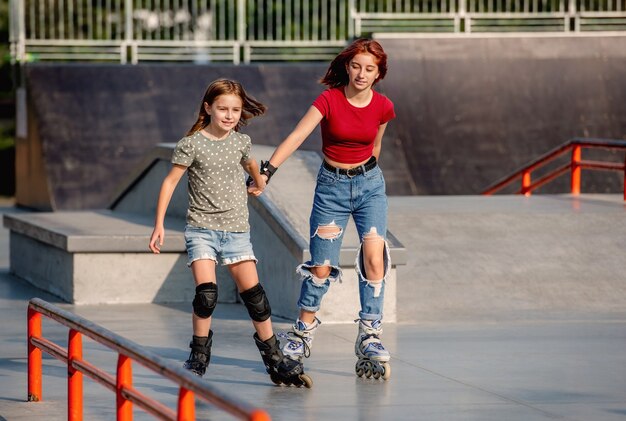 Girls with roller skates outdoors