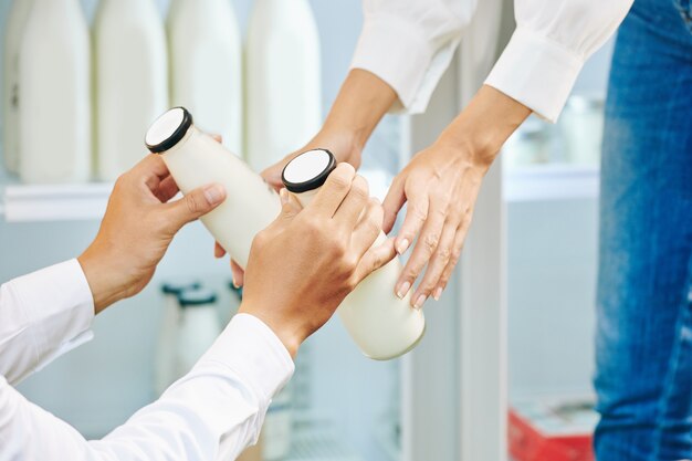 Giving Bottles With Milk