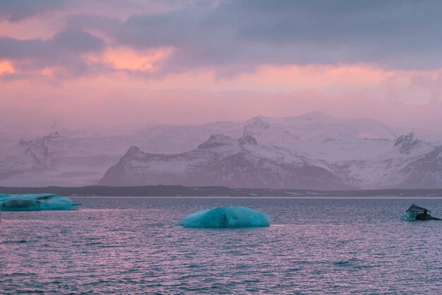 Glaciers against snowy mountains landscape photo