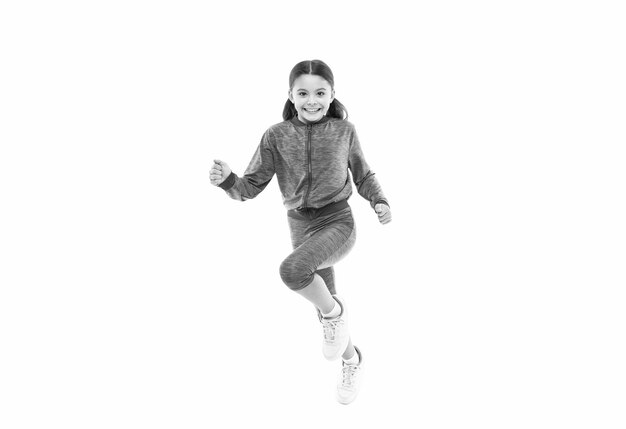 glad teen fitness girl run in studio teen fitness girl run on background photo of teen fitness girl run