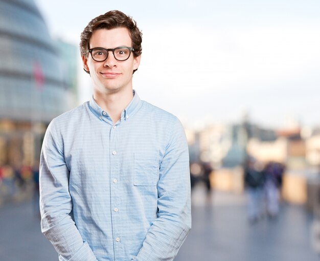 Glad young man posing